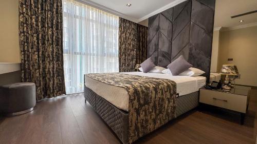 Postel nebo postele na pokoji v ubytování Alice Hotel Antalya