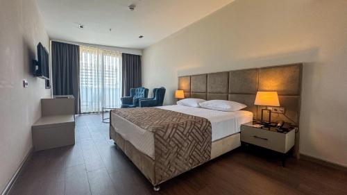 Postel nebo postele na pokoji v ubytování Alice Hotel Antalya