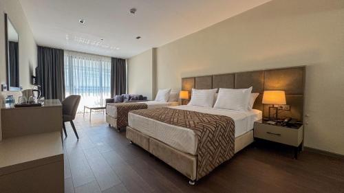Postel nebo postele na pokoji v ubytování Alice Hotel Antalya