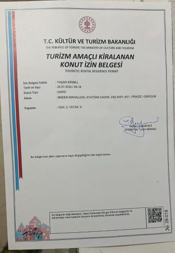 a sign on top of a computer monitor at Plaja yakın konforlu aile yuvası in Piraziz