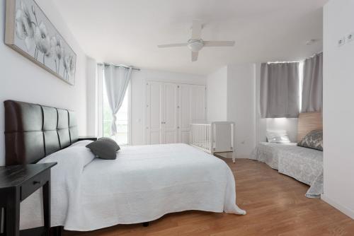 Postel nebo postele na pokoji v ubytování Villa En Bel Air
