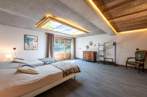 Postel nebo postele na pokoji v ubytování Chalet Le Courti
