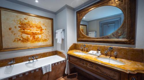 Salle de bains dans l'établissement Palazzo Hotel