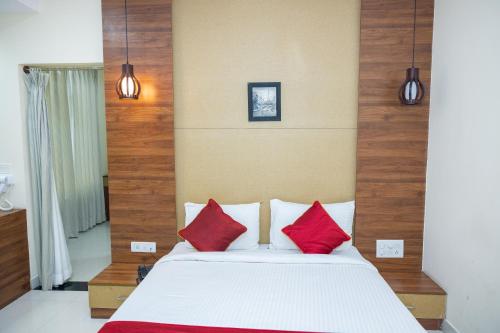 Cama o camas de una habitación en Ishwerya Suites