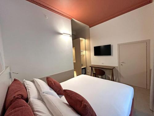 Cama o camas de una habitación en Astom Suites
