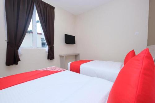Ένα ή περισσότερα κρεβάτια σε δωμάτιο στο Mancalin Hotel