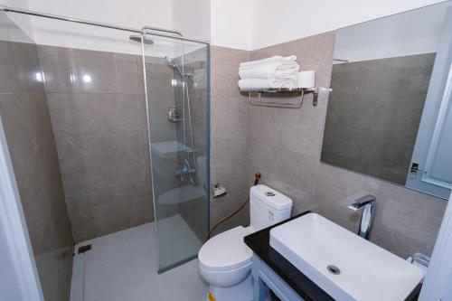 Ένα μπάνιο στο Hotel Apartment Royal Galaxy