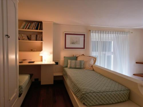 Ένα ή περισσότερα κρεβάτια σε δωμάτιο στο Appartamento Genova Nervi - Eden Panorama