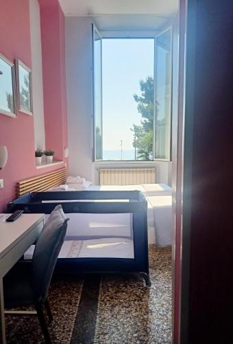 Ένα ή περισσότερα κρεβάτια σε δωμάτιο στο Hotel Serena