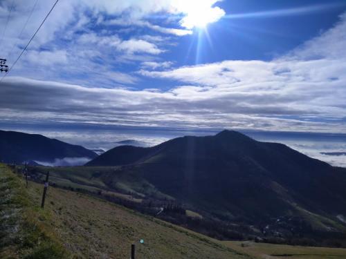 a view of the mountains under a cloudy sky at Casa Angy in Adrara San Rocco