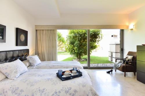 A bed or beds in a room at Villa Gran Canaria Specialodges