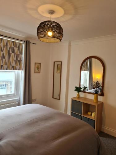 Katil atau katil-katil dalam bilik di Beautiful Apartment 3 Mins To The Beach