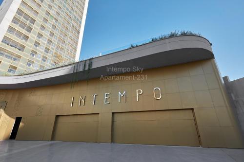 a building with the entrance to the entrance to an airport at INTEMPO SKY Apartament-231 in Benidorm