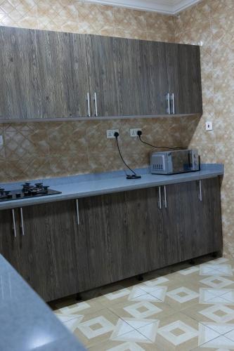 Η κουζίνα ή μικρή κουζίνα στο Atom Height Apartments