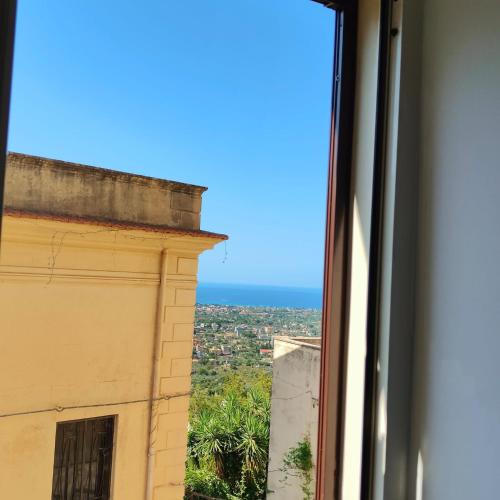a view of the ocean from a window at LA CASTELLANA Apartments in Carini