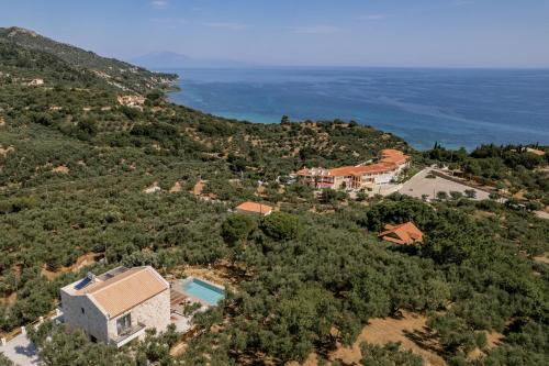 an aerial view of a house on a hill at Villa Cossoro Ena in Zakynthos in Xirokástellon