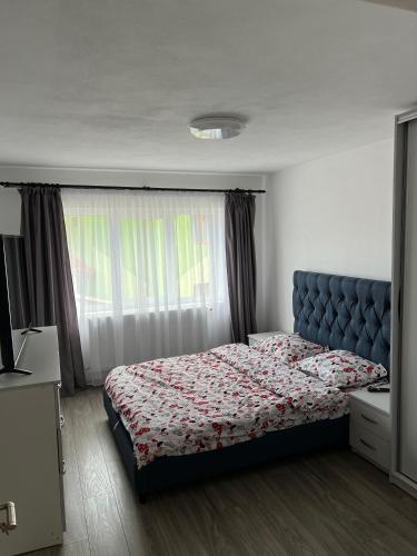 Postel nebo postele na pokoji v ubytování Casa Noni Via Transilvanica