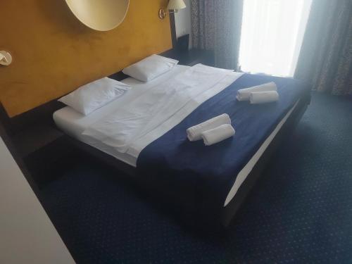 Postel nebo postele na pokoji v ubytování Apartments 29
