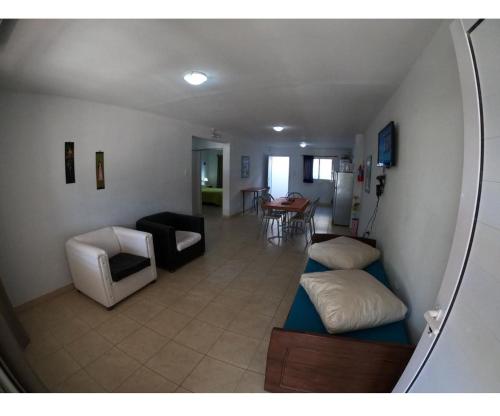 Χώρος καθιστικού στο Amanecer Las Grutas