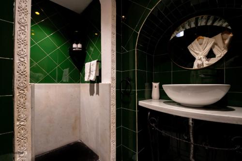 Ein Badezimmer in der Unterkunft Riad Lella Chama