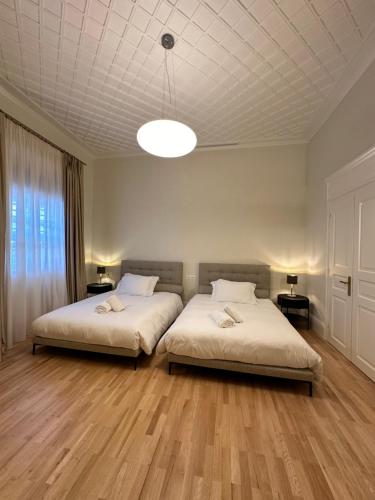 Letto o letti in una camera di Castellano Hotel & Suites