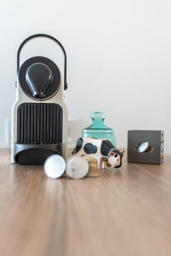 a close up of a radio and a camera on a wooden floor at Peter`s Lucky Home Balaton, Vonyarcvashegy in Vonyarcvashegy