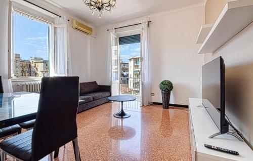a living room with a television and a couch at Lovely Apartment In Sestri Levante in Sestri Levante