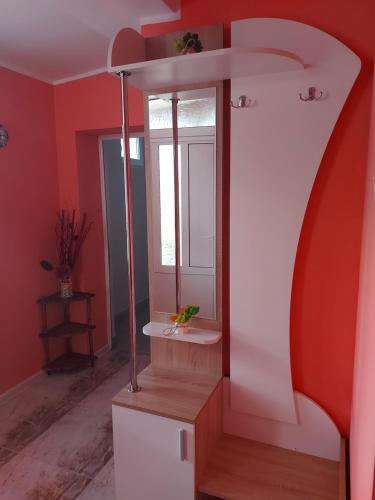 a bathroom with a sink and a mirror at Viktoria House in Sapareva Banya