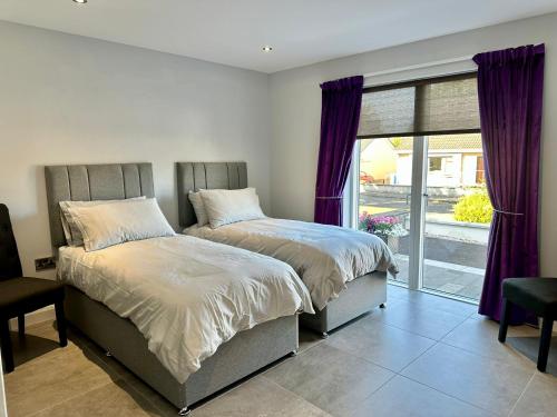 Ένα ή περισσότερα κρεβάτια σε δωμάτιο στο Beachy House St Andrews