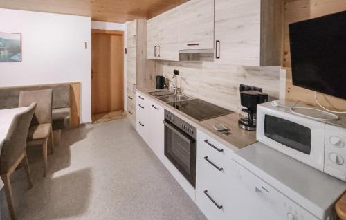 Kuchyň nebo kuchyňský kout v ubytování Ferienwohnung In Thiersee