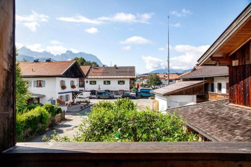 a view from a window of a town at Block's Post in Krün