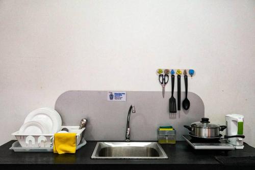 Η κουζίνα ή μικρή κουζίνα στο Cube8teen 1BR1B CozyStay 3 mins to Austin Height