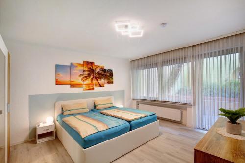 Katil atau katil-katil dalam bilik di Ferienwohnung Moni