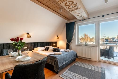 Posteľ alebo postele v izbe v ubytovaní Aparthotel Diamond SPA Family
