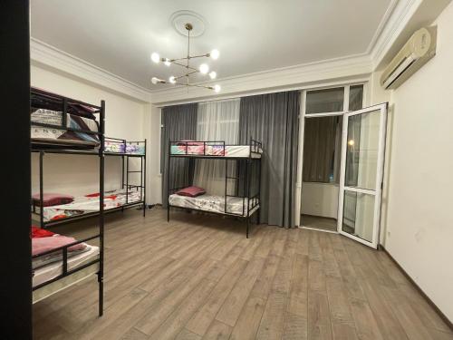 Ένα ή περισσότερα κρεβάτια σε δωμάτιο στο Savannah Pinoy Hostel
