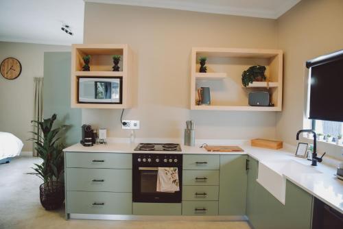 Kuchyň nebo kuchyňský kout v ubytování Welterusten Bij Kleine Schuur