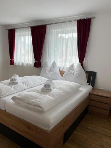 Postel nebo postele na pokoji v ubytování Lisingtal Premium SUPER-COSY Rooms