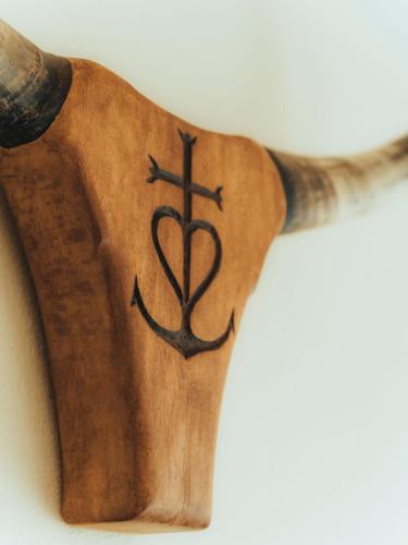 a wooden arm with an anchor on it at Hotel Mas Des Barres in Saintes-Maries-de-la-Mer
