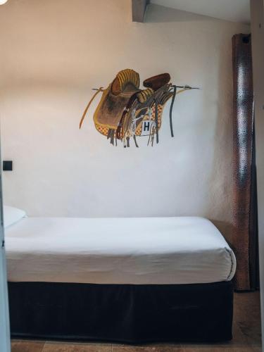 two bugs on the wall of a room at Hotel Mas Des Barres in Saintes-Maries-de-la-Mer
