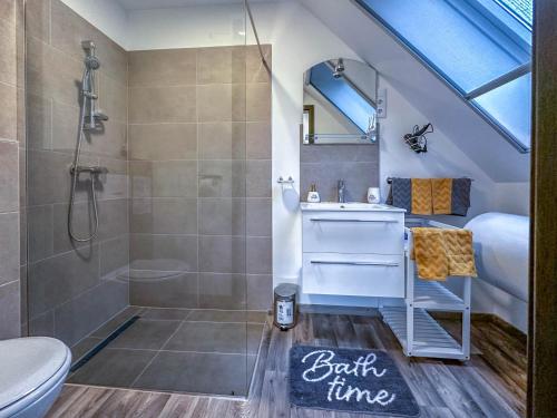 a bathroom with a shower and a sink at See Panzió in Fertőrákos