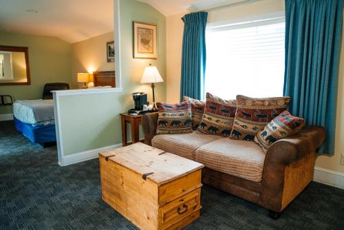 Ένα ή περισσότερα κρεβάτια σε δωμάτιο στο Salida Inn & Monarch Suites