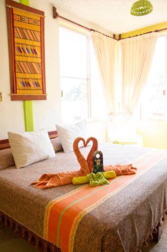 Ένα ή περισσότερα κρεβάτια σε δωμάτιο στο Hotel La Cabaña