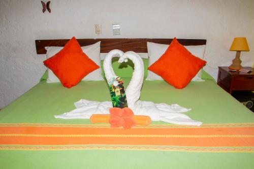 Ένα ή περισσότερα κρεβάτια σε δωμάτιο στο Hotel La Cabaña