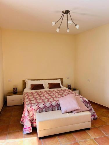 Ένα ή περισσότερα κρεβάτια σε δωμάτιο στο Casa Lacco