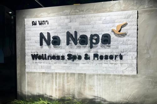 a sign for a no nappa wellness store and root at Na Napa Wellness Spa & Resort in Chiang Mai