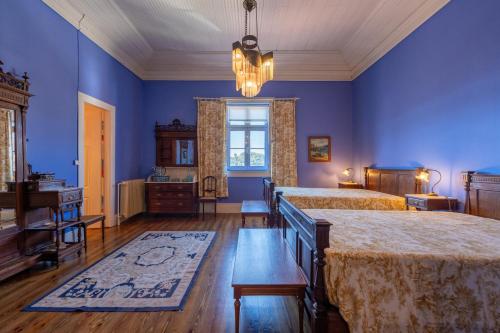 Ένα ή περισσότερα κρεβάτια σε δωμάτιο στο Casa d' Alem