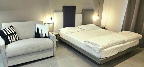 Ένα ή περισσότερα κρεβάτια σε δωμάτιο στο Apartament 59