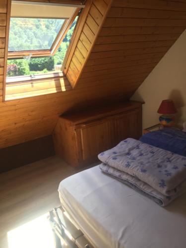 Una cama o camas en una habitación de Pyrène