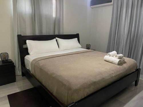 Postel nebo postele na pokoji v ubytování Hotel Casa Jum