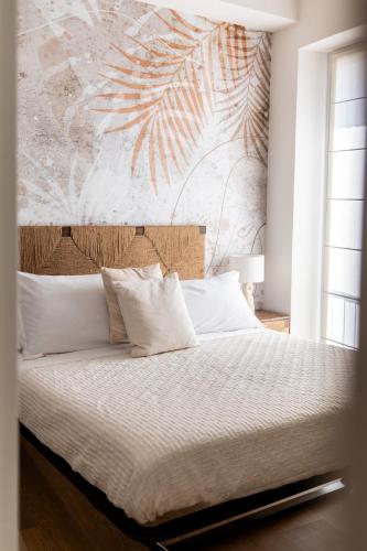 Cadamare charming rooms in Portovenereにあるベッド